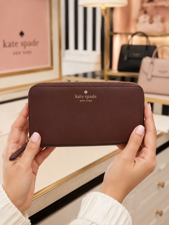 kate spade Handbags - kate spade Brown Leather Zip-Around Wallet with Gold Logo